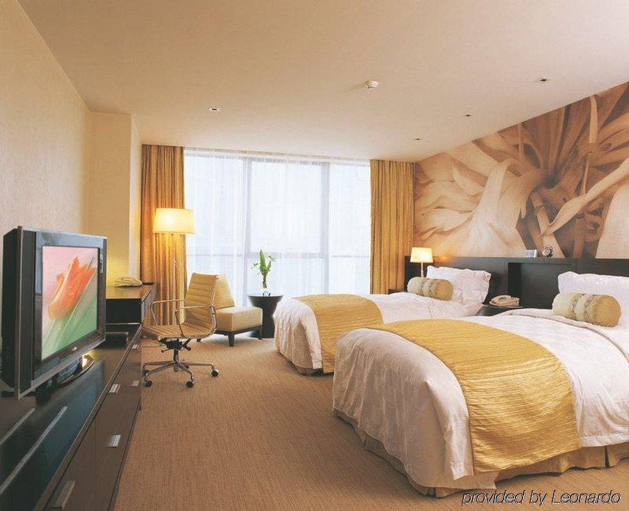 Southern Club Hotel Kanton Zimmer foto
